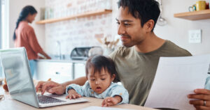 DMLO-father-and-kid-planning-future-at-computer