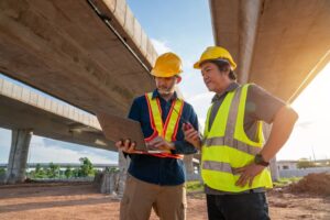 Contractors discussing documents